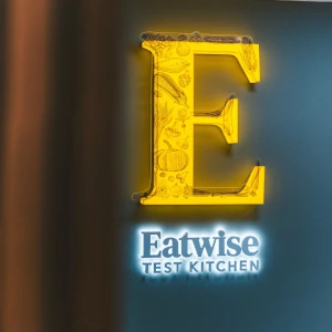 Eatwise Test Kitchen logo neon sign